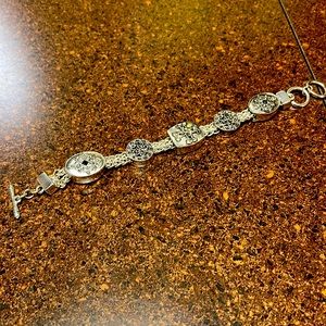 Customer jewelry bracelet silver in color